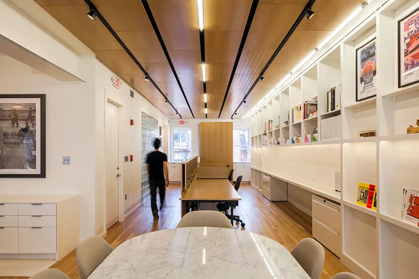 The long room at VIA Art, timber slats running the length of the ceiling